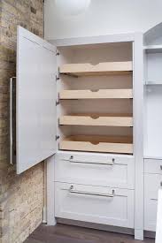Fabulous Kitchen Features Concealed Pantry Cabinets Fitted With Stacked Pull Out Drawers Next To An Expo Built In Pantry Kitchen Pantry Cabinets Kitchen Design