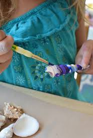 Add a silk rose on a bow with a hanging loop of 1/8 inch satin. Painting Shells With Watercolors Meri Cherry