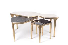 Whether your style is scandinvanian or modern, this table is a great place for your candles and plants. Cosmos Nesting Coffee Table S R Y Augousti
