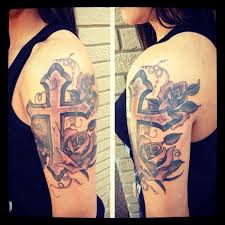 These tattoos can be inked anywhere on your body, so take your have you ever seen tattoos of crosses with animals in it? 22 Cross Tattoos On Half Sleeve