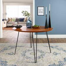 This is a high quality reproductions of the original design introduced in the 1950s which continues to grow in. Desert Fields Mid Century Modern Round Dining Table Walnut Walmart Com Walmart Com