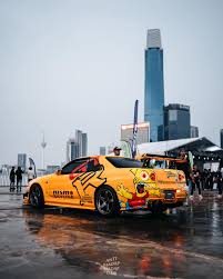 Aura? You mean @milrsgarage R34? Cant think of any other R34 at the show  that gives off the same feeling of when this one starts, a car that was  built to turn