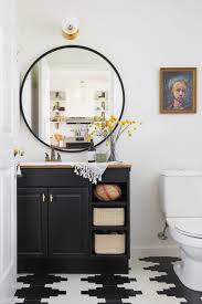 Decorations can easily become clutter in such a limited space. How To Decorate With Black And White In The Bathroom