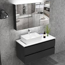 Unfortunately, the top surface of the cabinets is not covered by glass, marble, or quartz. China Wall Mounted Black Wooden Bathroom Wall Washbasin Storage Cabinet Design China Bathroom Cabinet Bathroom Vanity