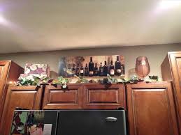 10 Best And Easy Red Wine Kitchen Decor Ideas Webnera Wine Decor Kitchen Decorating Above Kitchen Cabinets Wine Theme Kitchen