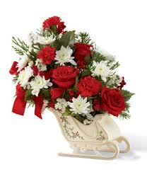 Santa S Rose Surprise At From You Flowers Holiday Flower Christmas Flowers Christmas Floral