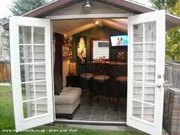 Wait Ll You See The Inside Of This Simple Backyard Shed It S Not What You Think Backyard Sheds Pub Sheds Bar Shed