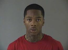 One armed robbery suspect arrested; warrant out for second