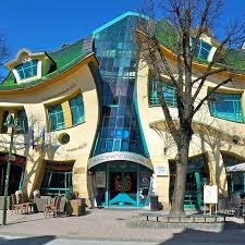 I knew from pictures what the house would look like. Krzywy Domek The Crooked Little House Of Sopot Poland That Sports A Distorted Illusory Front Facade