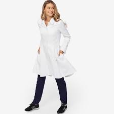 Gently Tailored At The Waist With Deep Skirt Pleats And A Tailored Collar The Solana Lab Coat Is Elegant Dramatic And 100 Pract Coat Lab Coat White Lab Coat