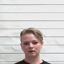 Woman accused of stabbing a man in a car in the Marigny: NOPD