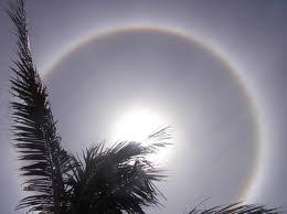 Also known as a nimbus, icebow or gloriole) is an optical phenomenon produced by ice crystals creating colored or white arcs and spots in the sky. Omens And Prophecies Rainbow Halo Around The Sun Whirling Rainbow Psychic Spirit In You