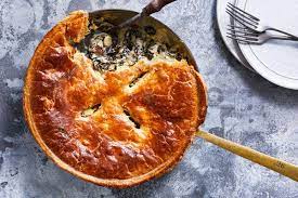 This One Skillet Vegetarian Pot Pie Trades The Traditional Chicken Filling For Creamy Garlicky Greens Hearty Greens Turn S In 2021 Recipes Vegetarian Pot Pie Pot Pie