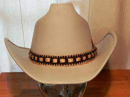 Light Tan Cowboy Hat With Woven Hat Band And Feather Size 7 Etsy Cowboy Hats Mens Hats Vintage Hat Band