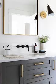 Matte Black And Gold Bathroom Accessories Pretty Black White And Grey Bathroom Gold And Matte Black Fixtures And Accents Stunning Guest Bathroom Small Bathroom Interior Design Traditional Bathroom