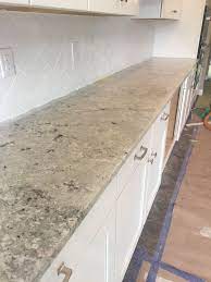 Granite countertop sample in cotton white. Cotton White Granite Slab White Granite Countertops Kitchen Remodel Inspiration Cotton White Granite