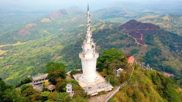 Ambuluwawa Tower spiral staircase 3567 feet Buddhist Hindu Christian mosque four religions Sri Lanka central highlands Gampola