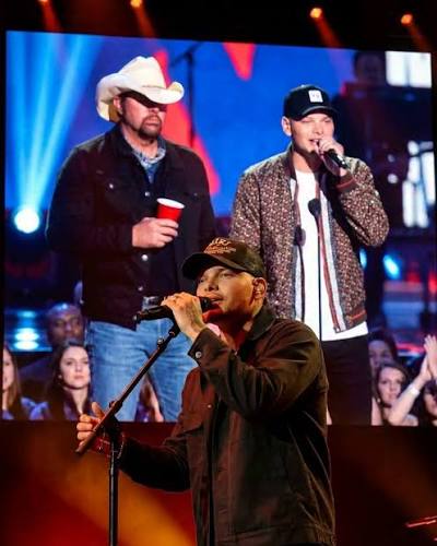 HE WAS REJECTED BY AMERICAN IDOL. 3 YEARS LATER, HIS HERO HANDED HIM AN AWARD ON NATIONAL TV. , Growing up, Kane Brown moved from town to town in Georgia, sometimes homeless and sleeping on couches. ...