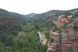 A sedona to grand canyon day is a popular option as sedona is a great base for exploring arizona as there are a number of great hikes and shopping to enjoy. Sedona Az Sedona At A Distance Taken From The Bridge Photo Picture Image Arizona At City Data Com Sedona Sedona Az Arizona