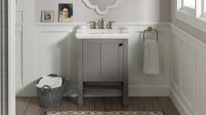 With a dark maple finish, the archer petite vanity stands independently on four flaring feet that straighten up to support the vitreous china bevelled basin. Kohler Vanities Kohler