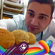 Chocolate panettone with candied cherry and chocolate glaze