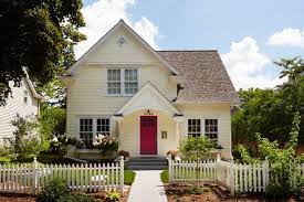 A white house paired with tan exterior trim, however, has an instant and cozy warmth. 9 Best Yellow Exterior Color Schemes To Increase Curb Appeal Jimenezphoto
