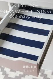 This diy custom kitchen drawer organizer was so easy to make and cost less than $10 for the entire project. How To Create Drawer Liners From Prettty Wrapping Paper