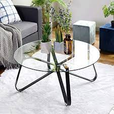 If you're looking for a clever storage solution without compromising on style, consider choosing a coffee table for the best of both worlds. Warmcentre Round Coffee Table 32 Modern Glass Coffee Tab Https Www Amazon Com Dp B07 Glass Table Living Room Round Coffee Table Modern Glass Coffee Table
