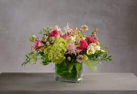 The color pink oozes cheer pink flowers also pair really well with white flowers or red flowers with a pop of green, blue or purple for contrast. Sloane Fresh Flowers And Berries In Pink Green And White Robin Wood Flowers
