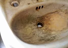 The edge of the coating will be hidden behind the refitted fixtures and a new bead of caulk. Cast Iron Sink Restoration Powder Room Arrow Hill Cottage