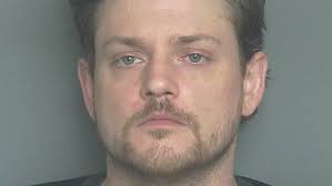 Man charged in mass shooting threats; another gets 28 years for threats