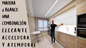 Estos se han panelado o elegido en blanco para que pasen inadvertidos. Cocinas Modernas Blancas Y Madera Cjr Youtube