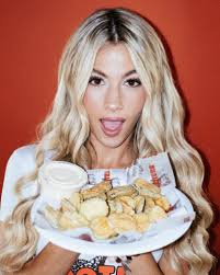 Congratulations to our very own, Eden Davis, for making it into the top  five for the 2021 Hooters Calendar Cover! 🧡 Thank you to everyone that  voted for her!