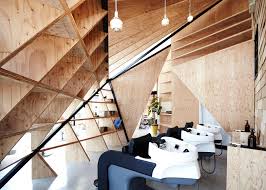 Shampoo units and styling stations will have to be either spaced out or a partition between each bowl and each station. Cohta Asano Divides Hair Salon With Diamond Shaped Partitions