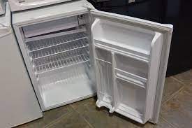 It was a pain in the ass, so if this vid helps anyone out White Kenmore Bar Fridge