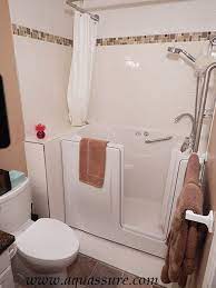 We replaced the tub with a wet room—an open shower without curtains or doors—and rain shower head to keep the lines clean and open up the room, arthur explains. Wit Installed In A Small Bathroom Another Perfect Fit Contact Us To Learn More About Our Products Www Aqua Walk In Tub Shower Tub Shower Combo Small Bathroom