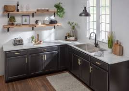 The island cabinets aren't actually attached, so we could move them out of the way when we installed the countertop along the walls. Vt Industries Inc