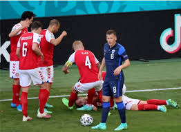 Eriksen has his left hand on his forehead and his right on his chest. 9x4dln1buyh5om