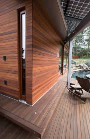 This #realcedar siding and pool deck is the perfect summer combo. Exterior Cedar