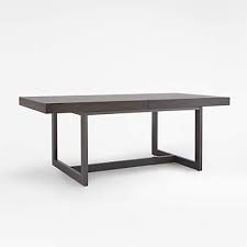 Table extends by pulling both ends and dropping in the leaf. Archive Extension Storage Dining Table Reviews Crate And Barrel