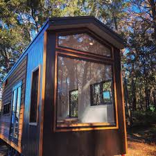 Stunning Window Wall Dominates Australian Tiny House Tiny House Rustic Tiny House Builders Buy A Tiny House