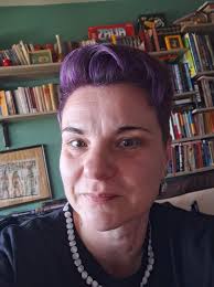 I'm 58 and was letting my hair go grey. Oh yuck! 😂 So I went and got my  hair colored plum with red undertones. I've always wanted purple hair and a  tattoo