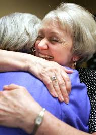 HANGING UP her UNIFORM