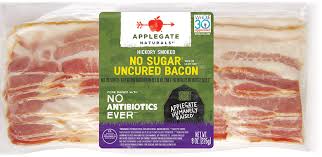 1 slice (11 g), 35 calories, 2 g fat, 1 this target brand bacon has reasonable sodium levels, but slightly higher levels of fat than other brands. Products Bacon Applegate Naturals No Sugar Bacon Applegate
