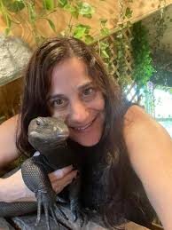 My boy Dexter doesn't care about the lizard resting