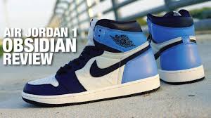 Inspired by the team colors of michael jordan's north carolina tar heels, this air jordan 1 is constructed of a premium leather all throughout the upper and combines sail, obsidian, and university. Air Jordan 1 Obsidian Review On Feet Youtube
