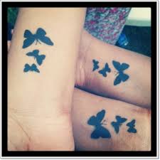 The cross design is as timeless as the sea. 101 Butterfly Tattoos To Put A Big Smile On Your Face