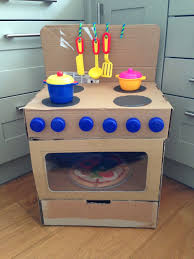 Without using wood or power tools, this mom managed to build the most elaborate cardboard. Cardboard Play Kitchen Cardboard Play Diy Crafts Crafts Cute766