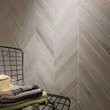 Highlight Your Space With An Eye Catching Focal Wall Use Wood Look Tile In A Chevron Pattern For Added Interest Wood Look Tile Floor Decor Flooring