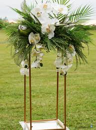 They can vary depending on the location and settings. Diy Tall Glam Gold Tropical Wedding Centerpiece